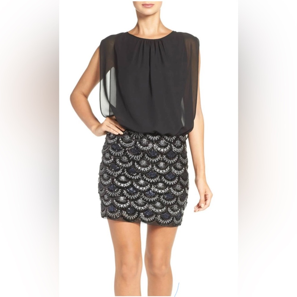 Aidan Mattox blouson dress with a gold and silver sequined skirt.
